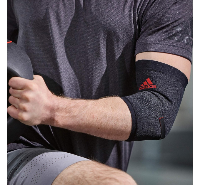 Фіксатор ліктя Adidas Performance Elbow Support чорний,червоний Уні S ADSU-13331RD S