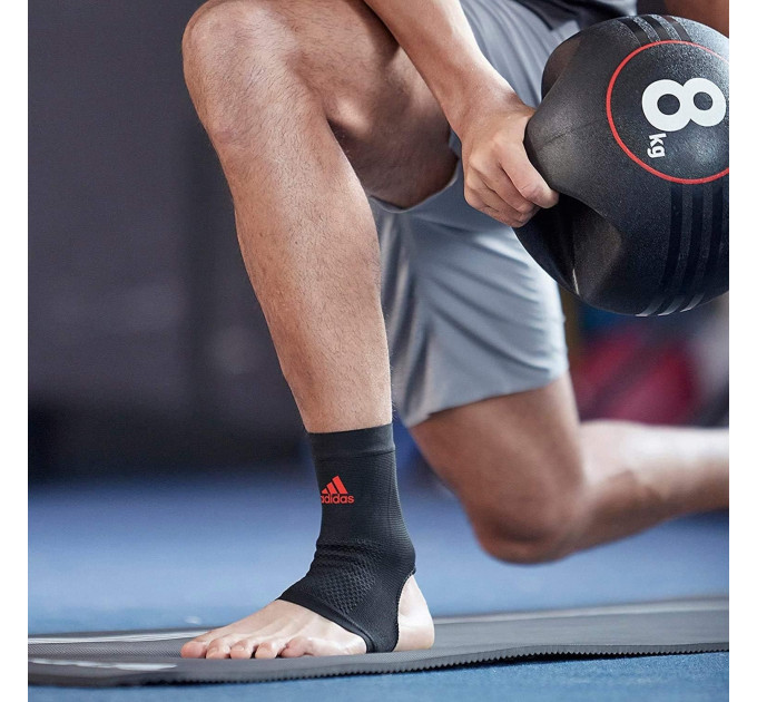 Фіксатор щиколотки Adidas Performance Ankle Support чорний,червоний Уні M ADSU-13312RD M
