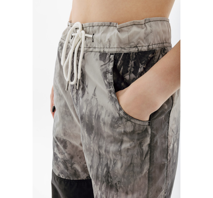 Жіночі Штани Nike W NSW WAVE DYE WVN PNT A3 Різнокольоровий XS (7dDX6952-010 XS)