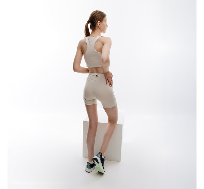 Жіночий Топ New Balance Essentials Reimagined Bra Бежевий XS (7dWB31500MBM XS)