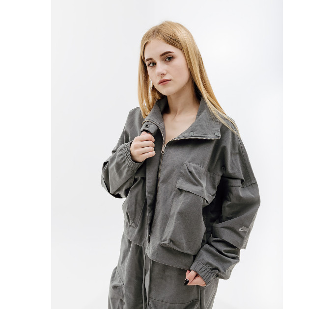 Жіноча ВІтровка Nike W NSW TP RPSTP JKT Сірий S (7dDV8487-050 S) Жіноча ВІтровка Nike W NSW TP RPSTP JKT Сірий S (7dDV8487-050 S)