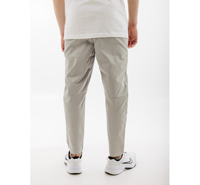 Чоловічі Штани Nike CLUB TAPER LEG PANT Сірий S (7dDX0623-077 S)