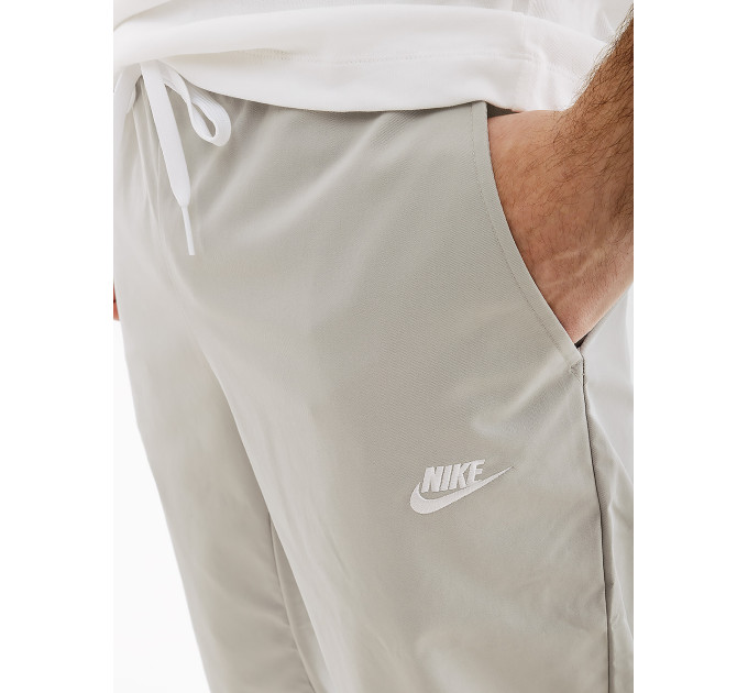 Чоловічі Штани Nike CLUB TAPER LEG PANT Сірий S (7dDX0623-077 S)